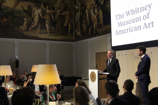 Adrian Hardwicke, director of visitor experience at the Whitney Museum of American Art, collects the Apollo Museum Opening of the Year Award