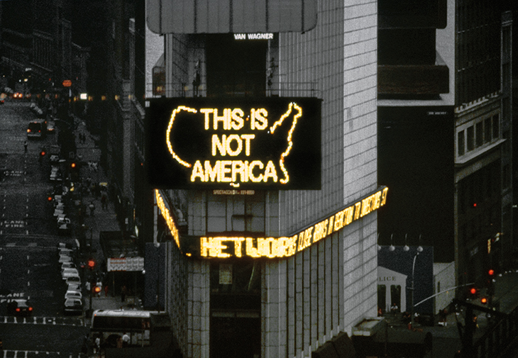 Still from a video documenting ‘A Logo for America’ (1987) by Alfredo Jaar in Times Square, New York.